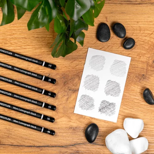 View image 5 of 7 for STAEDTLER Mars Lumograph Black Drawing Pencils Set: 6 Pack – Carbon Blend for Deep Black Tones, Professional Artists Pencils, 8B–HB Grades, Storage Tin, For Sketching, Shading & Fine Art Drawing